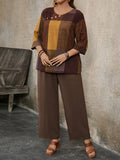 Completo da donna taglie forti: camicia a maniche 3/4 con collo rotondo, stampa a quadri e bottoni in legno abbinata a pantaloni a gamba larga