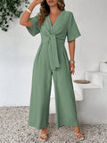Tuta casual alla moda taglie forti, monocromatica, con scollo a V e vita annodata, stile vintage