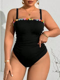 Costume da bagno intero con decorazione floreale e fascia superiore per taglie forti