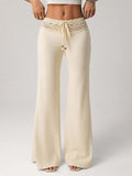 Pantaloni casual larghi da donna taglia comoda, in maglia bianca con patchwork, vita con cordoncino e perline, gamba dritta, stile bohémien