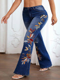Jeans a zampa di taglia comoda, lavati, con ricamo floreale