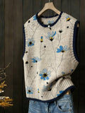 Maglione smanicato casual minimalista versatile con stampa a blocchi di colore grigio e blu, scollo a girocollo, perfetto per outfit primaverili