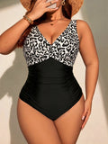 Costume da bagno intero con stampa leopardata e incrocio sulla schiena, taglie forti per donna
