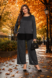 Completo da donna elegante taglie forti, composto da top e pantaloni in patchwork con paillettes