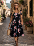 Abito a fiori di media lunghezza per taglie comode, scollo a V, linea ad A, maniche corte a campana, in tessuto morbido e elasticizzato, elegante