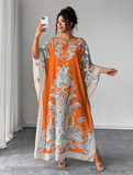 Abito casual oversize con maniche a pipistrello, scollo tondo e stampa
