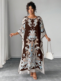 Abito casual oversize con maniche a pipistrello, scollo tondo e stampa